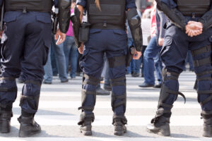 officer push teen by force
